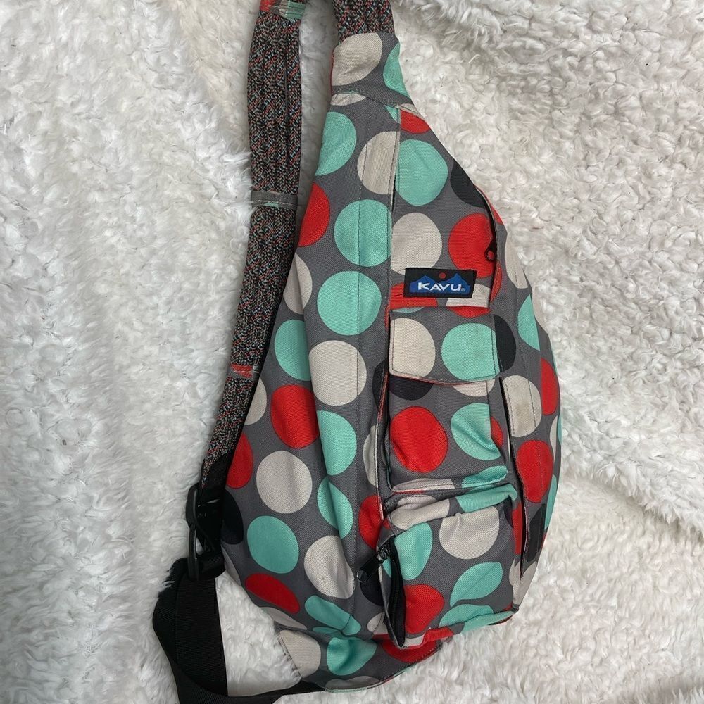 Kavu rope sling back/crossbody multi color canvas bag.